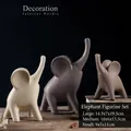 Set de 3 elefantes de cerámica nórdica en crema, gris y marrón decorativos - Juego Nórdico de Tres Colores de 3