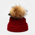 Close-up of dark red ribbed knit hat with a fluffy brown faux fur pom pom detail - Kids 50-53cm(1-5 Years) / Burgundy