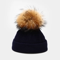 Detail of navy knit baby hat featuring chunky ribbed texture and a fluffy brown fur pompom - Kids 50-53cm(1-5 Years) / Navy Blue