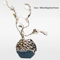 Modern emerald green ceramic vase with gold hollow patterns and white magnolia flowers - Gesang Vase + White Magnolia