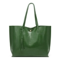 Minimalist oil wax leather bucket bag in deep green finish with tassel and gold snap - Green