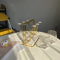 Modern gold metal cup holder with white base and two geometric transparent glass cups - Gold Cup Holder
