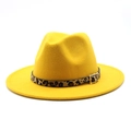 Close-up of a yellow felt fedora hat featuring a leopard print belt and golden buckle - Yellow