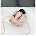 Detailed view of pink bucket bag with gold frame, pearl handle and chain strap - Pink