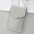 Crossbody phone bag with clear touchscreen back and golden heart buckle in light grey - Light Gray