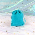 Detail of teal velvet drawstring jewelry pouch with soft texture on a dreamy backdrop - Knitted Velvet Lake Blue; 5*7cm