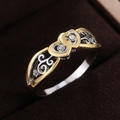 Elegant two-tone double heart ring with crystal inlay and intricate filigree details - US 6 / Gold/Silver