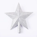 Macro view of a shimmering silver glitter star topper for a Christmas tree decoration - 20cm Silver