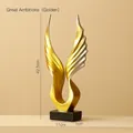Abstrakte Adler-Skulptur in Gold-Silber-Verlauf auf schwarzem Sockel, Höhe 42,5 cm - Gold & Silber-Flügel zum Erfolg