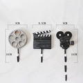Set di tre ganci a muro a tema cinema con pellicola, ciak e proiettore vintage - Set da 3 pezzi a tema cinematografico
