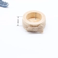 Detail of wooden cylinder candle holder with twine bow showing 1.8cm diameter and 2.5cm height - Small