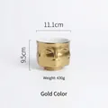 Nordic face ceramic vase in matte gold finish with 11.1cm diameter and 9.5cm height - C21-380H Gold