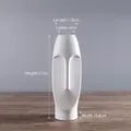 Modern white matte ceramic vase with abstract face sculpture design for home decor - White Medium (HP239)