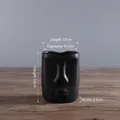 Schwarze matte Keramikvase im nordischen Design mit Gesichtsrelief für Tischdeko - Schwarz Klein (HP238)