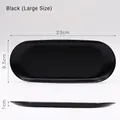 Grand plateau ovale en acier inoxydable noir mat moderne mesurant 23 cm par 9,5 cm x 1 cm - Grand / Noir