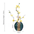 Modern emerald ceramic vase with golden floral carving and yellow jasmine flowers - Circle Point Vase + Winter Jasmine