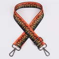 Adjustable crossbody bag strap featuring vibrant orange and black flame pattern webbing - Pattern 96 (Gunmetal Hook)