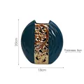 Modern dark green ceramic swan vase with gold floral relief detail and 20cm height - Yuandian Vase
