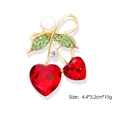 Golden cherry brooch with red heart crystals, green stones, and a pearl, size 4.4x3.2cm - Gold and Red Cherry (YNCP0607)