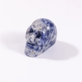 Hand-carved blue and white sodalite crystal skull sculpture for Halloween decor - Blue Spot Stone