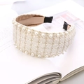 Detail of cream white tweed headband with elegant pearl trim on lifestyle magazine - Pearl Beaded Wide Style / White Houndstooth Small Plaid With Pearl