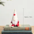 Christmas gnome ornament with red felt hat and wooden skis standing on vintage books - Style C-Skiing Gnome Figurine with Wooden Accessories