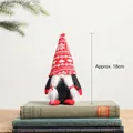 Christmas gnome ornament with red snowflake hat and black body sitting on books, 18cm - Style J-Gnome Girl with Braids Red Heart Hat