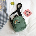 Grass green canvas crossbody bag with rainbow embroidery and adjustable black strap - Green