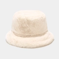 Detailed texture of the plush faux fur material on this creamy white bucket hat - Beige