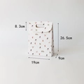 White Christmas gift bag with Santa and reindeer patterns in 26.5x19x9cm size - White Medium
