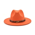Close-up of orange wool fedora featuring brown braided band and gold feather charm - Orange