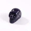 Deep blue goldstone skull carving with glittering particles and a polished finish - Blue Sandstone