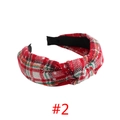 Close-up of red and green plaid fabric headband with a stylish knotted detail - Red Green Plaid Snowflake #2