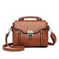 Brown vintage leather crossbody bag with top handle and decorative side zippers - Brown