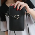Classic black touch screen crossbody phone bag with gold heart clasp and white stitching - Black