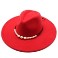 Detailed view of the black decorative band with white pearls on the red wool fedora hat - Adult 57-59cm / Red
