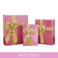 Scatole regalo di Natale rosa con fiocchi dorati e scritta Merry Christmas in tre misure - Scatola Regalo Quadrata Oro Rosa