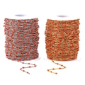 DIY Titanstahl-Perlenkette in Gold und Silber mit roten Perlen auf Spulen gewickelt - Goldene Kette / Orangerot