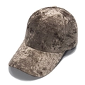 Detailed macro view of the bronze velvet baseball cap fabric texture and stitching - Brown