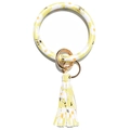 Detail view of yellow leather bracelet keychain with daisy pattern and fringe tassel - Bee