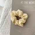 Pale yellow organza scrunchie with ribbed fabric texture and elegant minimalist design - Yellow Twill
