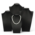 Set of four black PU leather necklace display busts featuring one with a pearl necklace - Small (Height 25cm) / Black