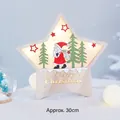 Wooden star-shaped Christmas LED light with Santa scene and Merry Christmas text - Santa Gnome with Star