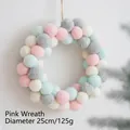 Noorse wolvilt krans in roze, munt en grijs, 25cm diameter, decoratieve kerstversiering - Roze en Blauwe Krans