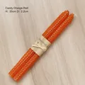 Zwei orangefarbene Bienenwachskerzen mit Wabenstruktur und rustikaler Bindfadenverpackung - Bienenwachs / Höhe 20cm Durchmesser 2,2cm / Orangerot
