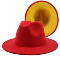 Detail view of two-tone wool fedora showing contrast red exterior and yellow interior lining - Red Outside Yellow Bottom