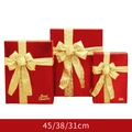 Three-piece red Christmas gift box set with gold bows in 45cm, 38cm, and 31cm sizes - Three-Piece Set / Red & Gold Square Gift Box