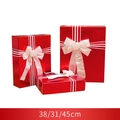 Three red metallic Christmas gift boxes with white ribbons in sizes 38cm, 31cm, and 45cm - Three-Piece Set / Red & White Square Gift Box