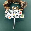 Close-up of 12cm acrylic Merry Christmas cake topper with reindeer and holiday icons - White Base Style B