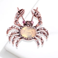 Antique bronze crab brooch with clear crystals and pink eyes on white base - Bronze Tone Cat's Eye Stone